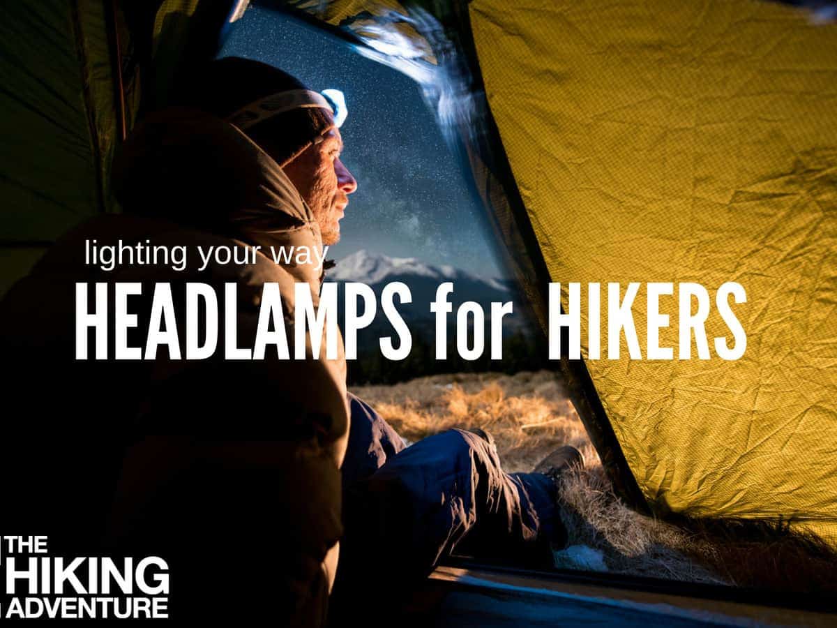 headlamp lighting up a campsite